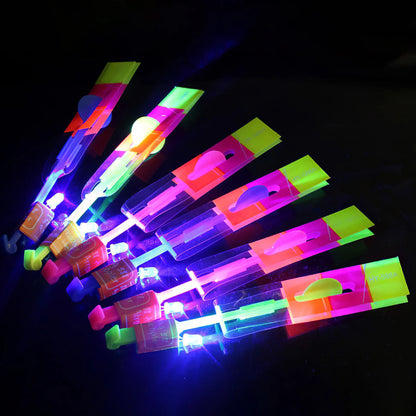 10PCS Outdoor Shining Rocket Flash LED Light Night Kids Luminous Slingshot Toys Shine Slingshot Elastic Helicopter Rotating Toy